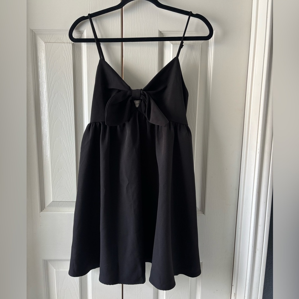 Impeccable Pig Bow Front Detail Babydoll Mini Dress in black
